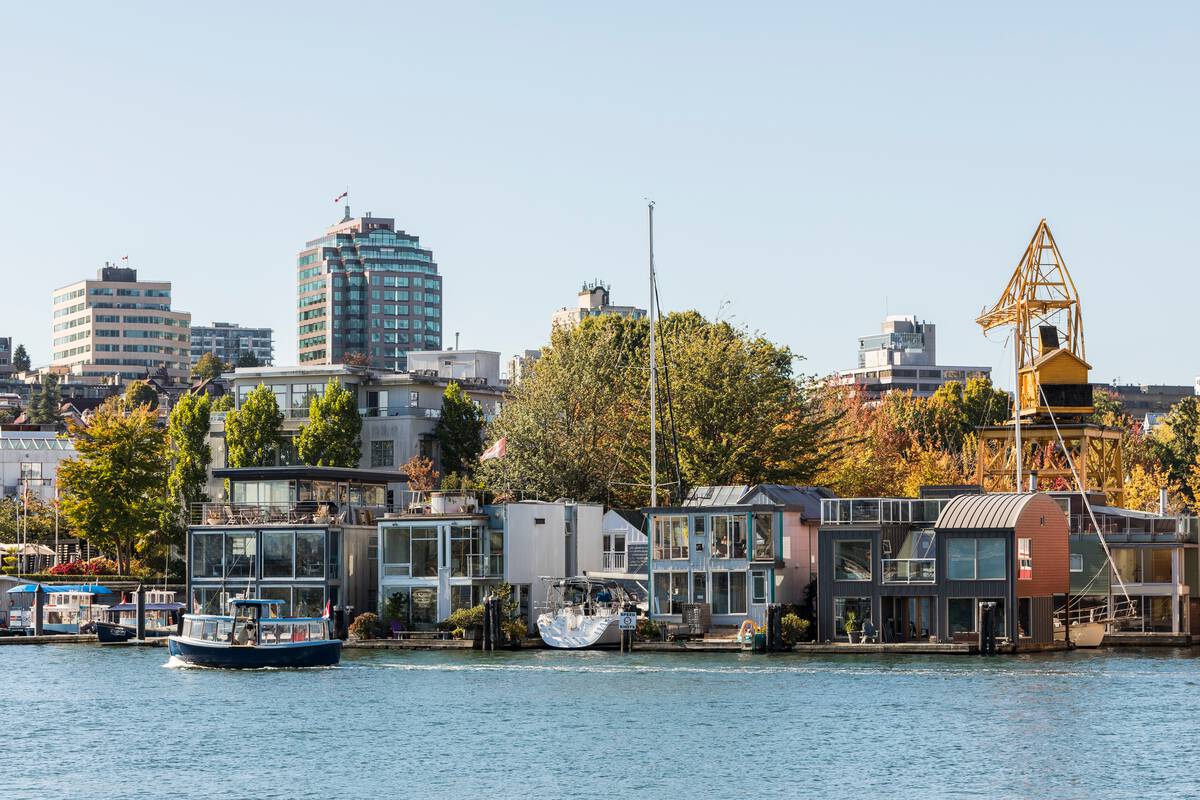 False Creek passenger ferry passes houseboats along False Creek